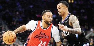 Normanl Powell has moved to Miami Heat and John Collins to Los Angeles Clippers as part of a three-team trade. GETTY IMAGES