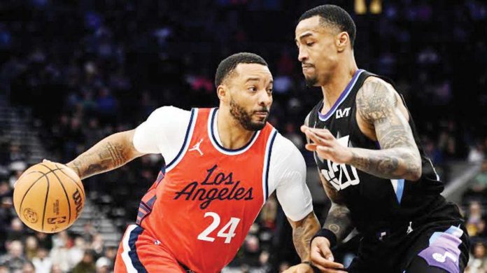 sports_Collins_copy_resized Normanl Powell has moved to Miami Heat and John Collins to Los Angeles Clippers as part of a three-team trade. GETTY IMAGES