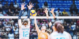 Farm Fresh Foxies’ Rachel Anne Daquis scores against the defense of Galeries Tower Highrisers’ Roselle Baliton. PVL PHOTO