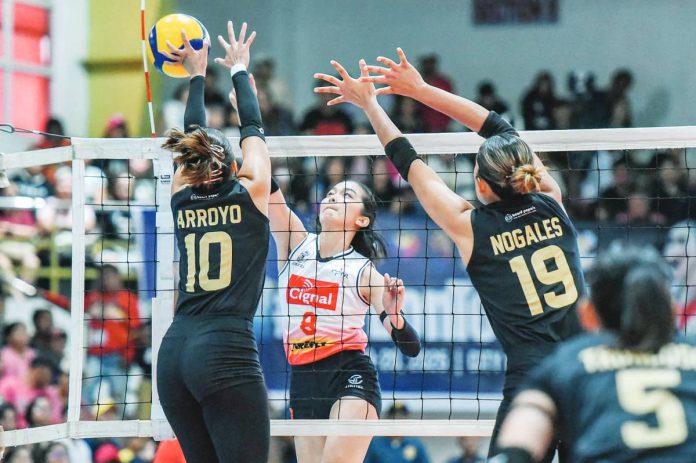 sports_HD_Spikers_resized Cignal HD Spikers’ Erika Santos attempts to score against the defense of ZUS Coffee Thunderbelles’ Chinnie Arroyo. PVL PHOTO