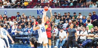 Ilonggo Jericho Cruz of San Miguel Beermen pulls up for a three-pointer against the defense of TNT Tropang 5G's Roger Pogoy. PBA PHOTO