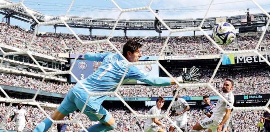 Paris Saint Germain FC’s Goncalo Ramos scores their fourth goal past Real Madrid FC’s Thibaut Courtois. PHOTO COURTESY OF KAI PFAFFENBACH/REUTERS