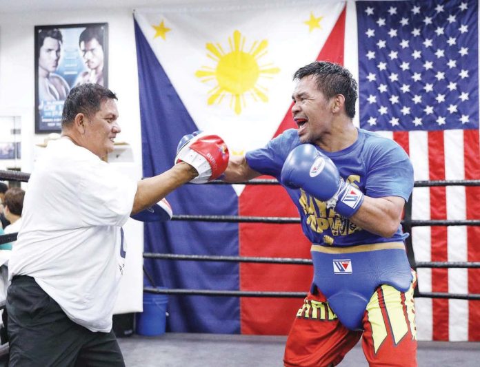 sports_Pacquiao_resized Manny Pacquiao spars with long-time friend Buboy Fernandez. He faces WBC welterweight champion Mario Barrios this Sunday (Philippine team) in Las Vegas. PHOTO COURTESY OF MANNY PACQUIAO