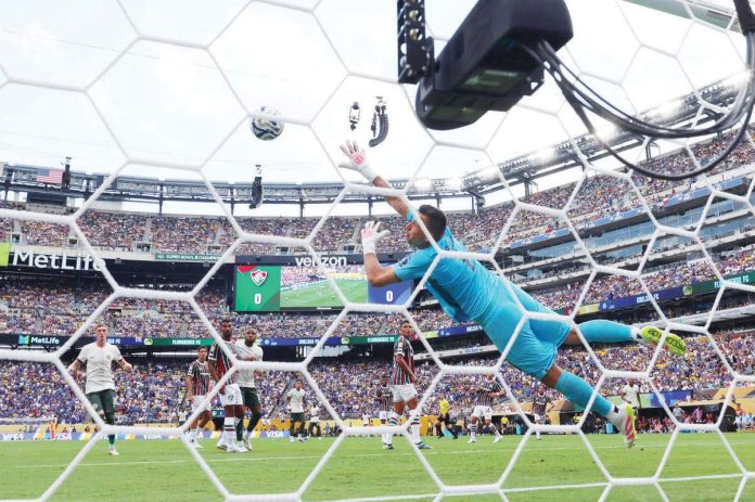sports_Pedro_resized Chelsea’s Joao Pedro scores his first goal past Fluminense’s goal keeper Fabio. PHOTO COURTESY OF MIKE SEGAR/REUTERS