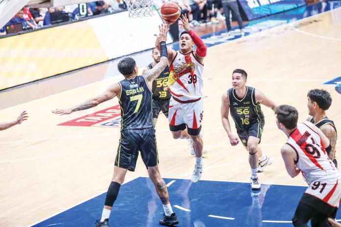 sports_SMB_resized Ilonggo Jericho Cruz of San Miguel Beermen goes for a basket against the defense of TNT Tropang 5G’s John Paul Erram. PBA PHOTO