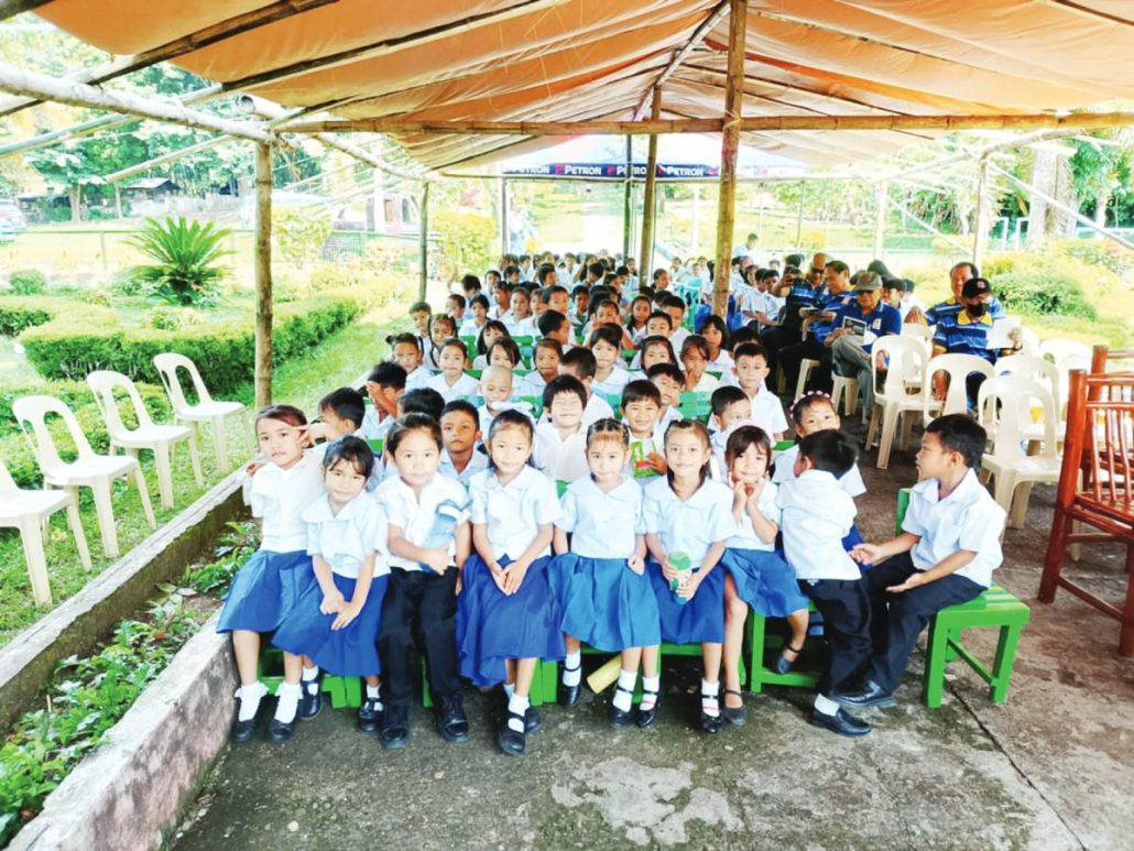 Members of the Kalantiao Masonic Lodge No. 187 with the Doroteo Lujan Elementary School learners