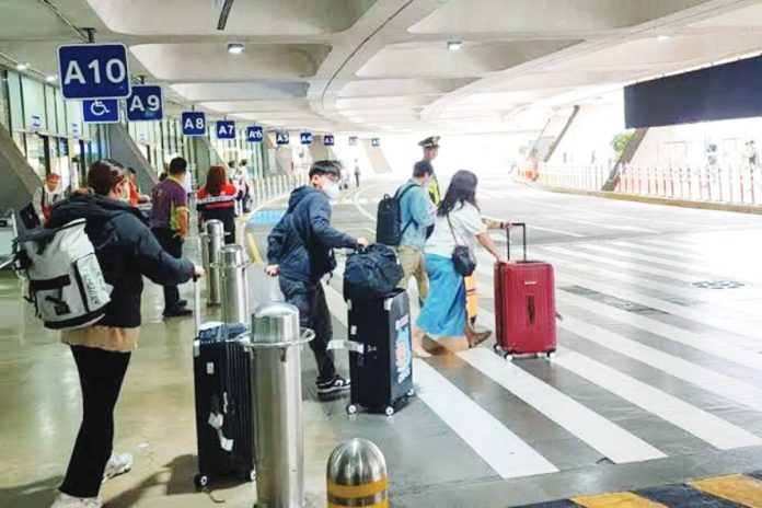 DOTr_to_NAIA_resized The Ninoy Aquino International Airport's private concessionaire has already improved the services at the airport, according to the Department of Transportation. PHOTO COURTESY OF ABS-CBN NEWS