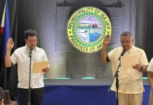 Senior Municipal Councilor Nestor Inocencio (right) takes his oath of office as the new vice mayor of Ibajay, Aklan, on Monday, August 11, 2025, succeeding the late Vice Mayor Julio Estolloso. The ceremony, held at the Sangguniang Bayan session hall, was administered by Mayor Jose Miguel Miraflores. IBAJAY LGU PHOTO