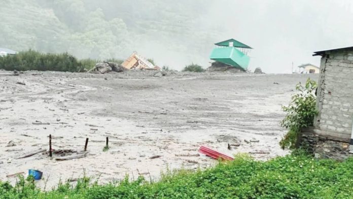 India A handout photo made available by the State Disaster Response Force (SDRF) Uttarkashi shows damage after a cloudburst triggered a mudslide near Harsil, Uttarkashi, Uttarakhand, northern India.