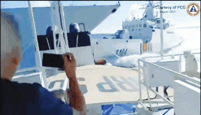 Two Chinese vessels collide in the waters off Panatag or Scarborough Shoal on Aug. 11, 2025, in this screen grab of a Philippine Coast Guard video.