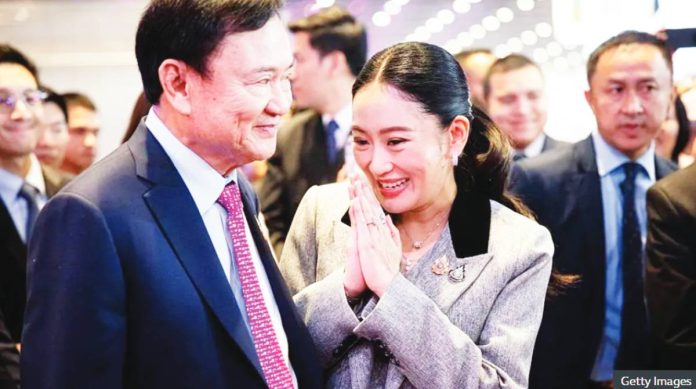 Thailand Paetongtarn Shinawatra with her father Thaksin. GETTY IMAGES