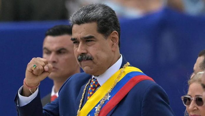 Venezuela Venezuela’s President Nicolas Maduro pumps his fist during Independence Day celebrations. AFP VIA GETTY IMAGES