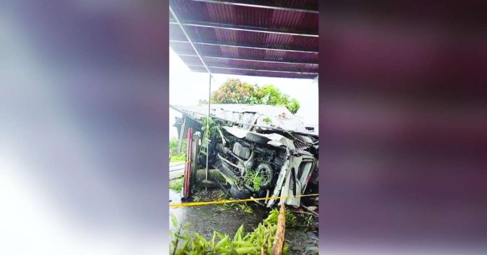 The van carrying 11 students overshot the road and overturned, resulting in the deaths of two students and injuries to several others including the driver on Monday morning, August 25, in Barangay Cadajug, Laua-an, Antique. PHOTO COURTESY OF K5 ANTIQUE UPDATES
