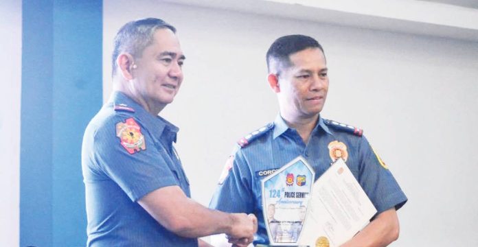 bacolod_cops_feted_resized The Bacolod City Police Office (BCPO) was awarded as Best City Police Office during the 124th Police Service Anniversary celebration of the Police Regional Office-Negros Island Region (PRO-NIR) on Monday, Aug. 18, 2025. Photo shows BCPO director Colonel Joeresty Coronica (right) receiving the award from PRO-NIR director Brigadier General Arnold Thomas Ibay (left). PRO NEGROS ISLAND REGION PHOTO