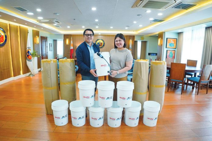 banner pic ABOITIZ INFRACAPITAL DONATES WATER FILTRATION SYSTEMS TO ILOILO CITY. (From left) AIC First Vice President for Corporate Affairs Christopher M. Camba led the turnover of 50 water filtration systems to the Iloilo City Government, represented by Iloilo City Mayor Raisa Treñas, at Iloilo City Hall. Each filtration bucket can provide up to 1 million gallons of safe drinking water.