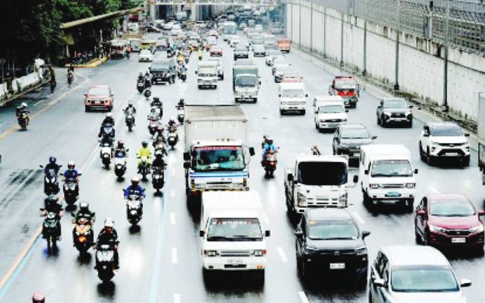Car sales rose 1.4 percent year on year in July this year, according to data released by the Chamber of Automotive Manufacturers of the Philippines, Inc. and the Truck Manufacturers Association on Thursday, Aug. 14, 2025. Photo shows vehicles plying along Commonwealth Avenue in Quezon City on July 25, 2025. PNA PHOTO BY BEN BRIONES