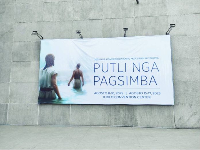 lyndie JW1 copy 1 A large banner announcing the 2025 Jehovah’s Witnesses Regional Convention with the theme “Putli nga Pagsimba” (Pure Worship) is displayed outside the Iloilo Convention Center at the Iloilo Business Park in Mandurriao, Iloilo City, where thousands are expected to gather on August 8–10 and 15–17.