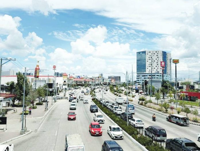 mai rising business copy Traffic flows along Sen. Benigno Aquino Jr. Avenue in Iloilo City’s Mandurriao district, a bustling hub that continues to attract new businesses as the city posts steady growth in business permits and tax collections. MA. THERESA LADIAO/PN