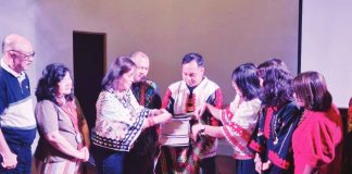 Sen. Loren Legarda (third from left) joins authors, editors, and cultural advocates in ceremonially presenting copies of Panagway: The Ati in the Narratives and the Archives and Bádbad: Untangling Archived Knowledges on Panay Bukidnon Life and Culture during a book launch on Aug. 9, 2025, at the Pagwa Performing Arts Hall, Museum of Arts and Cultural Heritage, University of the Philippines Visayas in Iloilo City. The event celebrated the rich heritage of the Ati and Panay Bukidnon peoples of Panay and Guimaras. UNIVERSITY OF THE PHILIPPINES VISAYAS PHOTO