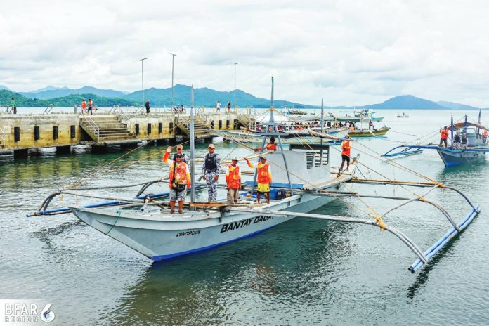 neljoy fisheries Members of the Iloilo Provincial Bantay Dagat Task Force aboard their patrol boat prepare to set out for another operation against illegal fishing in northern Iloilo waters. The persistence of illegal fishing highlights the difficulty of stamping out destructive practices even with intensified patrols and community programs.