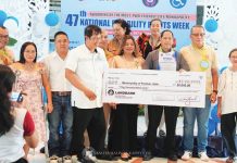 Representatives from the Municipality of Pototan, Iloilo receive a symbolic check worth P50,000 and a plaque after being hailed as the most Persons with Disabilities-friendly local government unit in Iloilo Province during the awarding ceremony at the capitol grounds on July 28, 2025, as part of the 47th National Disability Rights Week celebration. PHOTO FROM BALITA HALIN SA KAPITOLYO
