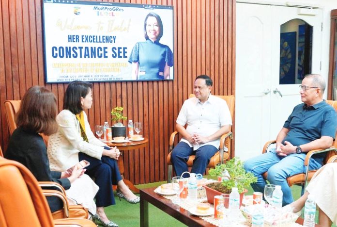 Singaporean Ambassador to the Philippines Constance See (second from left) discusses potential partnerships in agriculture, trade, and technology with Iloilo’s Gov. Arthur Defensor Jr. (second from right) during her courtesy visit to the provincial capitol, joined by Provincial Administrator Raul Banias (right). PHOTO FROM BALITA HALIN SA KAPITOLYO