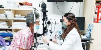 Western Visayas Medical Center eye specialist Dr. Erika Bicol conducts a post-surgery eye examination on a 70-year-old cataract patient. Bicol says the elderly woman developed the condition due to aging, as cataract commonly affects seniors. NELJOY N. GALIGAO/PN