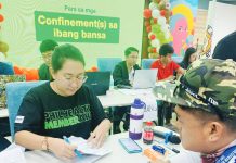 Philippine Health Insurance Corporation personnel validate membership status of Iloilo City Government employees.