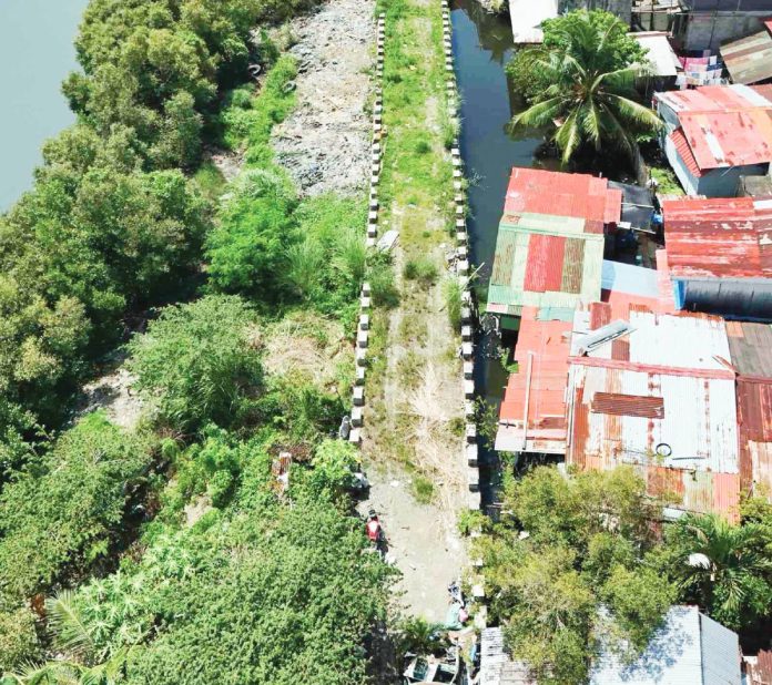 secondary city hall (1) WHERE’S THE FLOOD CONTROL? Despite a multi-million peso budget and a December deadline, the Flood Mitigation Structure in Lapuz District by the Department of Public Works and Highways remains unfinished. Budburan-Mansaya Creek is still un-rehabilitated, overgrown with vegetation, and shows no visible sign of the promised structure. Surrounding barangays, which were among those heavily flooded last month, blame defective or incomplete flood control projects across the city. The situation has fueled public frustration and intensified calls for a full investigation into public works along Iloilo City’s waterways.