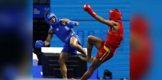 Negrense Carlos Baylon Jr. battles Islam Karimov of Kazakhstan in a bronze medal game. PSC PHOTO