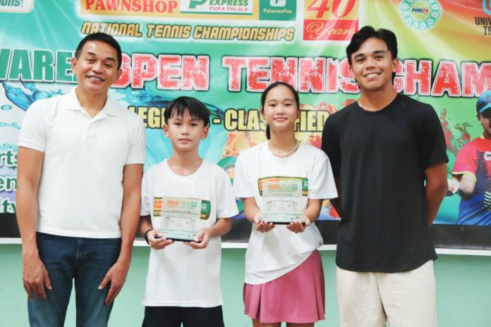 sports Bugna Kathlyn Bugna (second from right) holds her trophy after clinching another twin-title feat and earning MVP honors anew in the Cong. Eric Olivarez National Open Tennis Championships in Parañaque City. CONTRIBUTED PHOTO