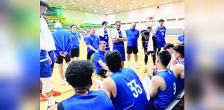 Gilas Pilipinas head coach Tim Cone talks to his players during their tune-up game against Jordan. PHOTO COURTESY OF SBP