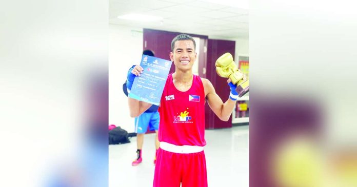 sports Jara_superimposed The golden triumph of Flint Jara of Bago City, Negros Occidental stood out as the highlight of the national contingent’s campaign in the 2025 Belt and Road International Boxing Tournament in Xinjiang, China. CONTRIBUTED PHOTO