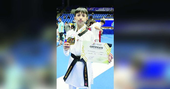 sports Negrense copy_superimposed Dondy Santillan Jr. swept all his matches in the 2025 Asian Cadet Taekwondo Championships for the country's first gold in the regional tournament after a decade. FACEBOOK PHOTO