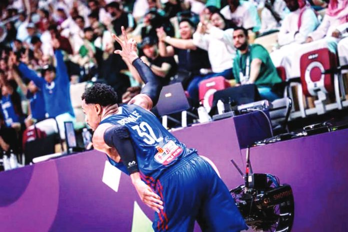 sports_Brownlee.JPG_resized Gilas Pilipinas’ Justin Brownlee gestures after knocking down a three-pointer against Saudi Arabia. FIBA PHOTO