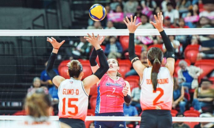 sports_Cool.JPG_resized Creamline Cool Smashersâ Michele Gumabao attempts to score against Cignal HD Spikersâ Heather Guino-o and Roselyn Doria-Aquino. PVL PHOTO