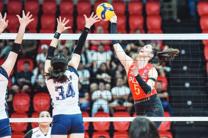 sports_High.JPG_resized PLDT High Speed Hitters’ Alleiah Malaluan attempts to score against a Kobe Shinwa University player. PVL PHOTO