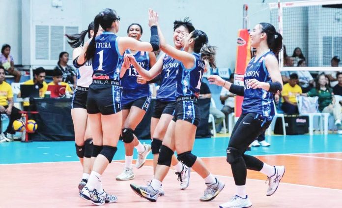 Adamson University Lady Falcons, led by Shaina Nitura, rejoices after scoring a point against Ateneo de Manila University Blue Eagles. SSL PHOTO
