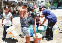 As Iloilo continues to grow, the need for affordable, reliable water has never been more urgent. Photo shows Iloilo City residents receiving free cold water for washing and bathing from a private company in April 2024.