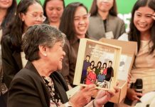 Palawan Group Co-founder and Deputy Chairman, Angelita M. Castro, smiles warmly at the graduates as they handed a token and appreciation to the Castro family