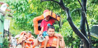 Disaster Response Group (DRG) Team 1 of Coast Guard District Southern and Northern Negros rescued several families in Barangay Banago, Bacolod City on September 26. PHOTO COURTESY OF RMN DYHB BACOLOD