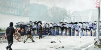 UNDER SIEGE. The anti-riot unit of the Manila Police District uses shields during a rowdy protest at the approach of Ayala Bridge in Manila on Sept. 21, 2025. The police arrested an initial 17 suspects. PNA
