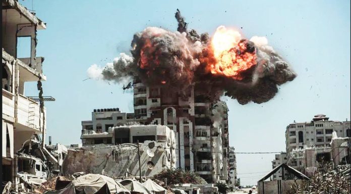 Israel A tower block is hit by Israel’s military air strike in Gaza City. Israel ramped up air strikes on Gaza City in recent days. GETTY IMAGES