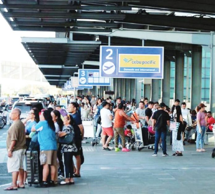 NAIA terminal fees1 Every departing international passenger at the Ninoy Aquino International Airport (NAIA) is now paying P950 for terminal fees and P390 for domestic travelers. The New Naia Infra Corp. said that NAIA terminal rates remain cheaper than those in neighboring countries. PHOTOS COURTESY OF PHILIPPINE DAILY INQUIRER