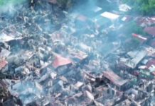 This aerial shot shows the aftermath of a three-hour fire that hit Purok Cheriza, Barangay 27, Bacolod City early Friday morning, September 12, 2025. The Bureau of Fire Protection-Bacolod City said at least 180 houses were destroyed and 36 others were damaged. REYNAN LARIDA/FACEBOOK PHOTO