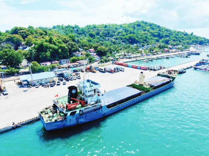 The first international cargo ship from Vietnam docks at the Culasi Port in Roxas City for the delivery of a rice shipment in July this year. MAYOR RONNIE DADIVAS/FACEBOOK PHOTO