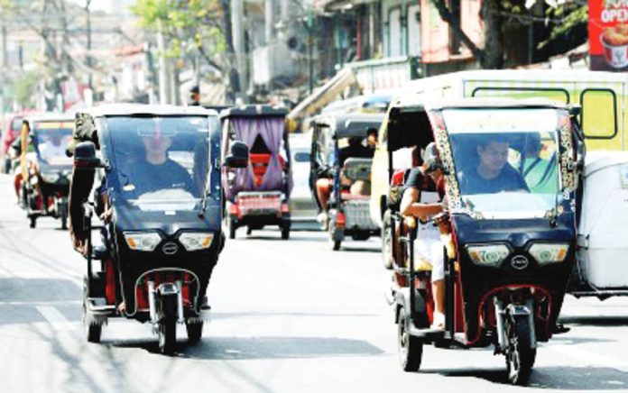 The Department of Energy says harmonizing the country’s electric vehicle (EV) recognition guidelines will reduce administrative burdens, increase transparency, and accelerate EV adoption nationwide. Photo shows electric tricycles plying the streets of Tondo, Manila. FILE PNA PHOTO BY YANCY LIM