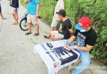 A former village chief (second from right), now employed as a job hire by the local government of Calinog, Iloilo, was arrested during a buy-bust operation on September 25, 2025, in Barangay Baje San Julian, Calinog. IPPO PHOTO