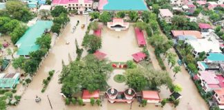 This aerial view of Barangay Poblacion, Ibajay, Aklan was taken hours after Typhoon “Opong” unleashed flooding that submerged the town. SCREENGRAB FROM PARISH OF ST. PETER THE APOSTLE/FACEBOOK