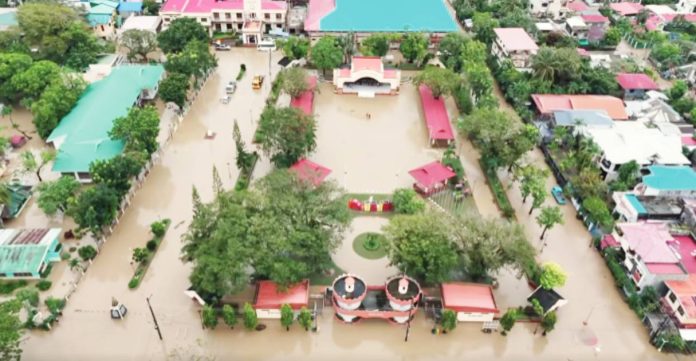 This aerial view of Barangay Poblacion, Ibajay, Aklan was taken hours after Typhoon “Opong” unleashed flooding that submerged the town. SCREENGRAB FROM PARISH OF ST. PETER THE APOSTLE/FACEBOOK